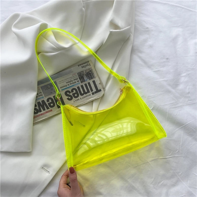 At Off The Dome by Makeda Iroquois, step into Y2K fashion with Off The Dome's Vivid Transparent Shoulder Bag. This statement accessory blends nostalgia with modern style.