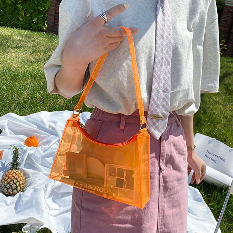 At Off The Dome by Makeda Iroquois, step into Y2K fashion with Off The Dome's Vivid Transparent Shoulder Bag. This statement accessory blends nostalgia with modern style.