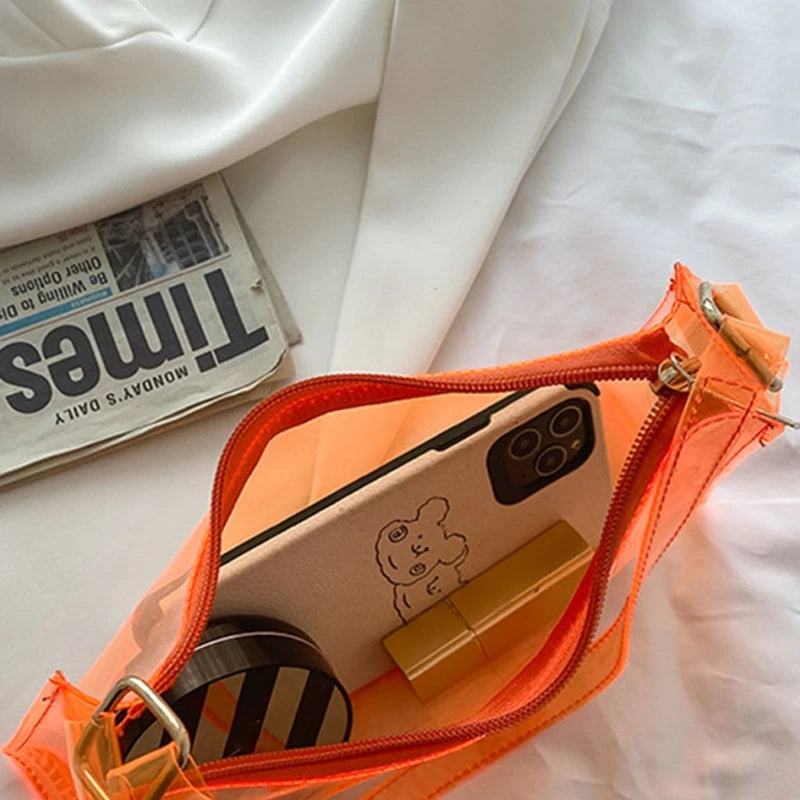 At Off The Dome by Makeda Iroquois, step into Y2K fashion with Off The Dome's Vivid Transparent Shoulder Bag. This statement accessory blends nostalgia with modern style.