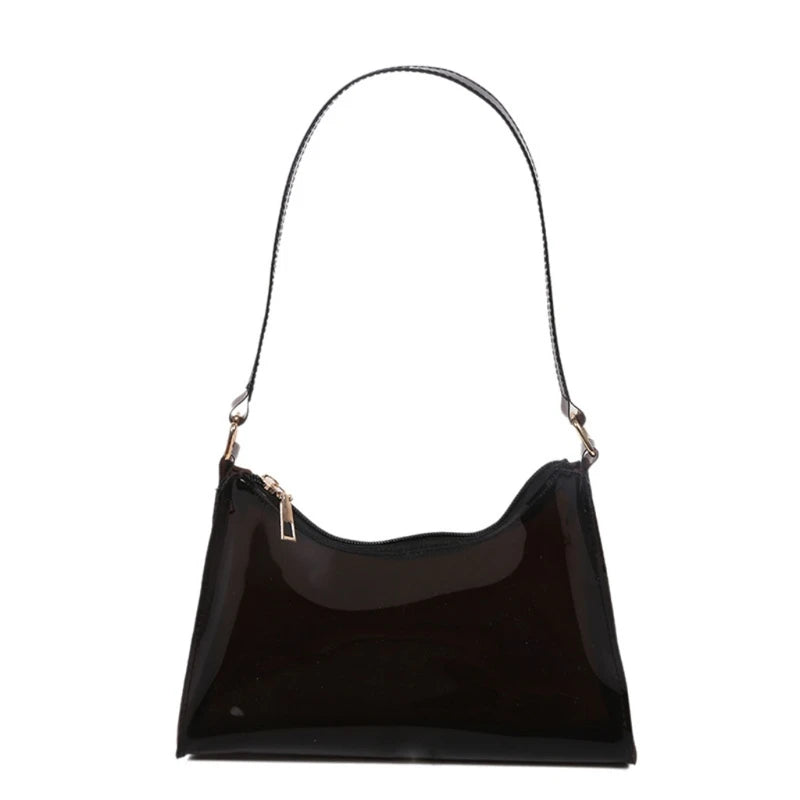 At Off The Dome by Makeda Iroquois, step into Y2K fashion with Off The Dome's Vivid Transparent Shoulder Bag. This statement accessory blends nostalgia with modern style.